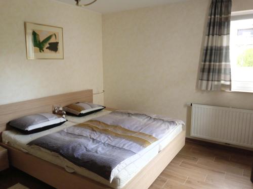 Säng eller sängar i ett rum på Primeurs appartement haut standing de 85 m², Luxembourg-Kirchberg