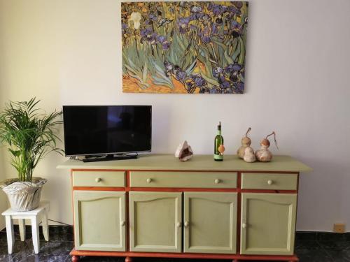 TV a/nebo společenská místnost v ubytování Casa Trasmallo