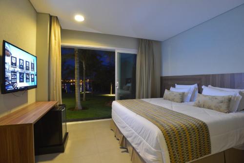 Postel nebo postele na pokoji v ubytování Malai Manso Cotista - Resort Acomodações 8 hosp