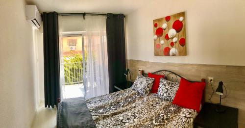 A bed or beds in a room at Apartamento Gasparot
