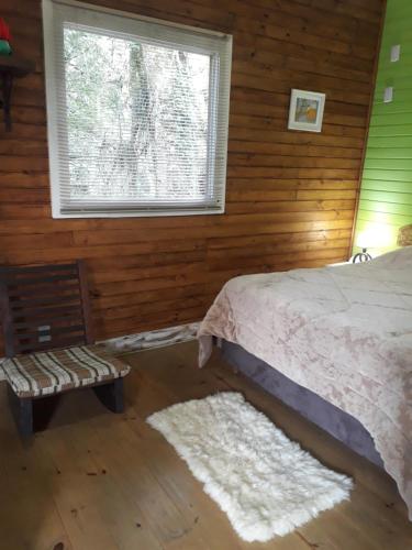 Cama o camas de una habitación en Cabanas El Polista