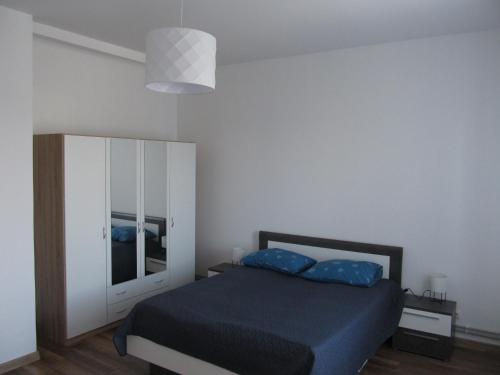 Postel nebo postele na pokoji v ubytování Appartment Ipsum
