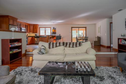 a living room with a couch and a table at Summer and Fall in Sheffield with Monthly Special Pricing Available in Sheffield