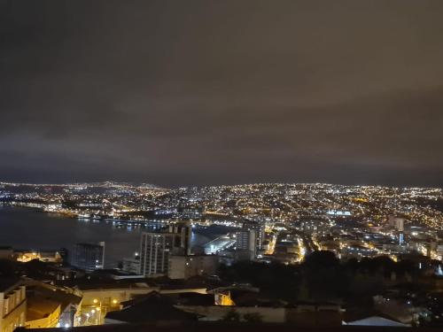 a city at night with a sky background at BO Hotel & Terraza in Valparaíso