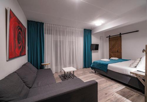 Voodi või voodid majutusasutuse Hotel Joli Bergen toas