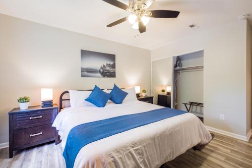 a bedroom with a bed and a ceiling fan at Cute Condo in Rock Hill-53 in Rock Hill