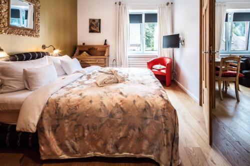 Cama o camas de una habitación en GL Suites