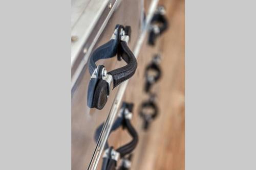 a bunch of black locks on a door at Huize Copes apartment Den Haag, 2 bed, 2 bath in The Hague