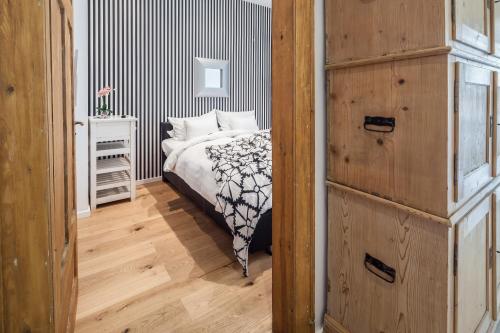 Cama o camas de una habitación en GL Suites