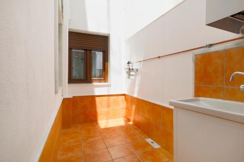 Koupelna v ubytování Tejón y Marín, nuevo apartamento en casco antigüo
