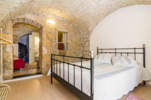 Кровать или кровати в номере Casa Blù