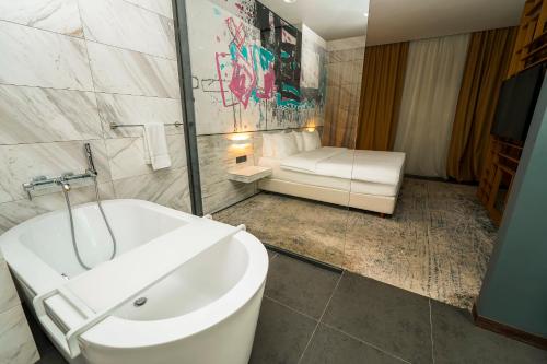  Messier 53 Hotel Yerevan -  Room  picture :   Tea/Coffee maker    Minibar    Shower                           