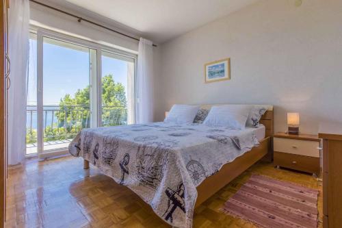 Posteľ alebo postele v izbe v ubytovaní One-Bedroom Apartment in Crikvenica 48