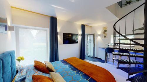 TV a/nebo společenská místnost v ubytování B&B Ferienhof AB Wellness Suite