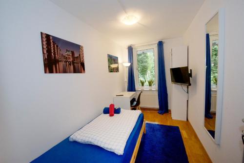 Postel nebo postele na pokoji v ubytování Basement Rotherbaum