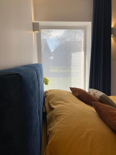 Postel nebo postele na pokoji v ubytování B&B Ferienhof AB Wellness Suite