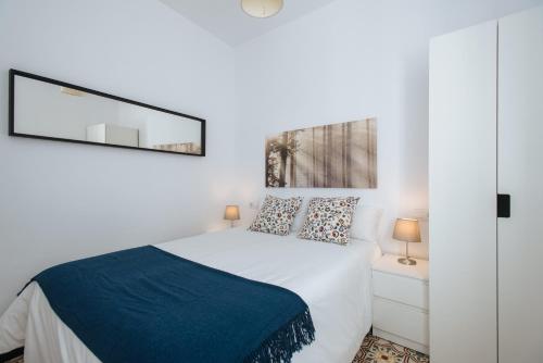 Katil atau katil-katil dalam bilik di Magnifico Apartmento Cruz de la Tinaja