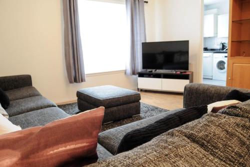 Zona d'estar a Peaceful and Quiet Apartment in a Bustling City