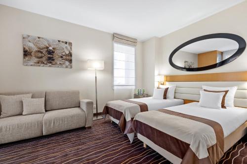 Ένα ή περισσότερα κρεβάτια σε δωμάτιο στο Molo Residence