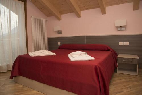 Letto o letti in una camera di Hotel San Lorenzo
