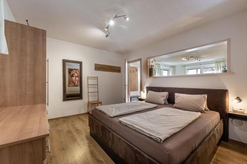 Posteľ alebo postele v izbe v ubytovaní Ferienwohnung Alpenglück