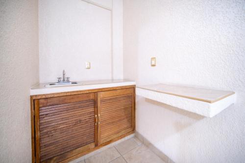 Koupelna v ubytování PENINSULA STAYS Executive Hotel
