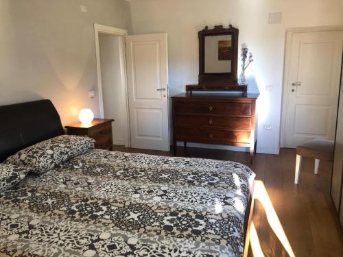A bed or beds in a room at La casa ai Pozzi