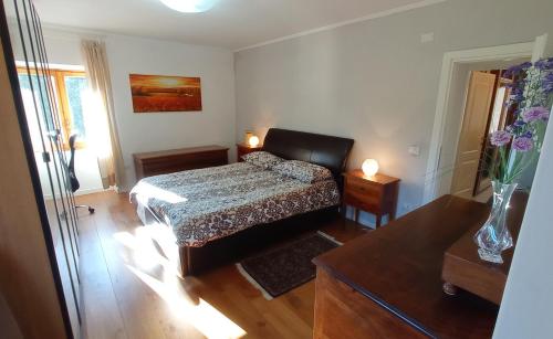 A bed or beds in a room at La casa ai Pozzi