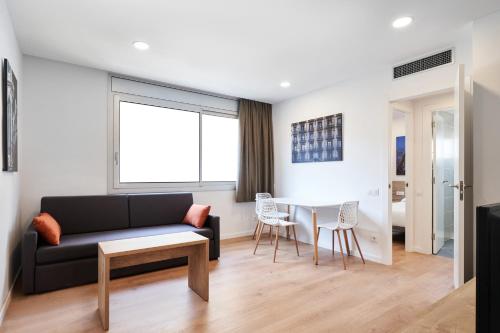 Гостиная зона в Aparthotel Augusta