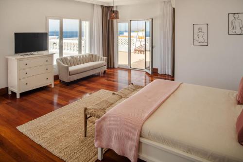 Posteľ alebo postele v izbe v ubytovaní ODIN LUXURY VILLA by Buenavilla
