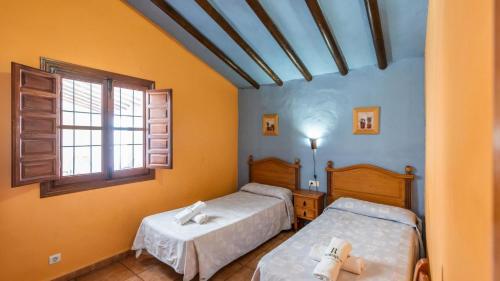 Postel nebo postele na pokoji v ubytování Casa Levante Almachar by Ruralidays