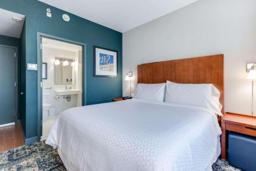 Vista LIC Hotel, Premier Collection by Best Westernにあるベッド
