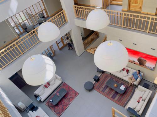 an overhead view of a living room with white fixtures at Chospa Hotel, Leh in Leh