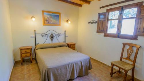 Postel nebo postele na pokoji v ubytování La Casita Montefrio by Ruralidays