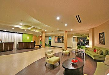 a large living room with a couch and a table at Fairfield Inn Suites Elkin Jonesville in Elkin