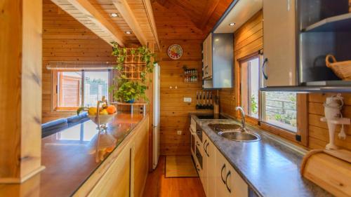 a kitchen with a sink and a counter top at Casa Alegria Almayate Alto by Ruralidays in Almayate Alto