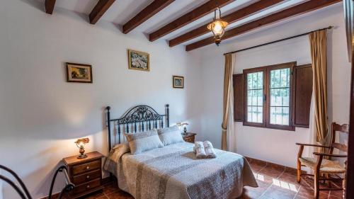 Posteľ alebo postele v izbe v ubytovaní Casa La Encina Alora by Ruralidays
