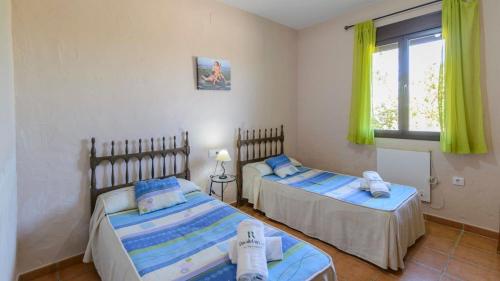 Posteľ alebo postele v izbe v ubytovaní Casa La Colina El Gastor by Ruralidays