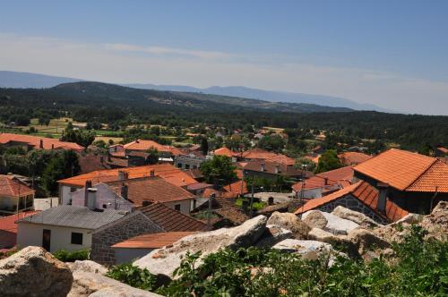 a view of a town from a mountain at Pinheirinhos - Quinta de São Caetano in Carapito