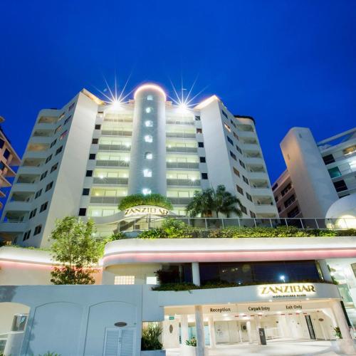 a large building with lights on top of it at Mantra Zanzibar in Mooloolaba