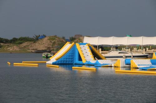 a water park with a slide in the water at Paradise corner in Pondicherry