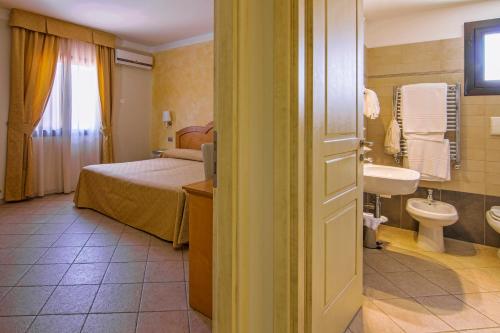Koupelna v ubytování Hotel La Perla