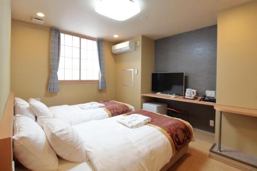 Krevet ili kreveti u jedinici u okviru objekta Arakawa-ku - Hotel / Vacation STAY 22248