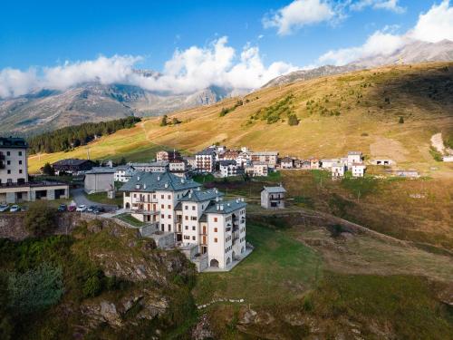 an aerial view of a village on a hill at Casa in un'esclusiva zona di Motta di Sotto in Motta