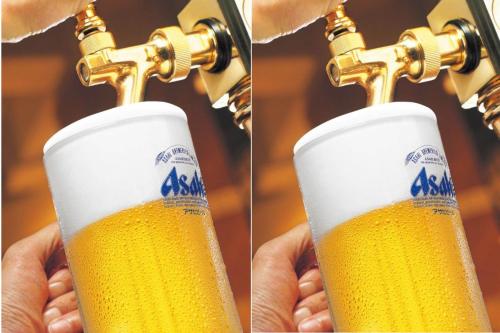 two bottles of beer being poured into at Hotel Senke in Myoko
