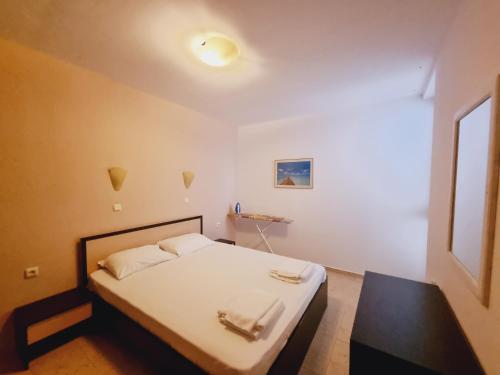 Ένα ή περισσότερα κρεβάτια σε δωμάτιο στο Breeze Apartment Complex