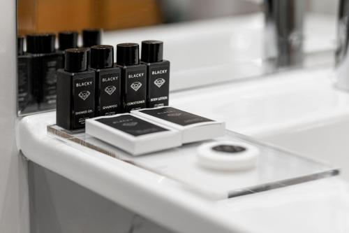 a group ofiazepines sitting on top of a counter at Tomis Garden Aparthotel Bucuresti in Bucharest