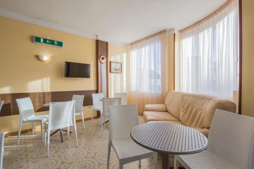 TV a/nebo společenská místnost v ubytování Hotel Rosy