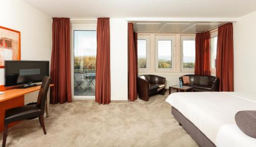 Katil atau katil-katil dalam bilik di Hotel am Rhein