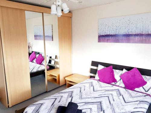 Ένα ή περισσότερα κρεβάτια σε δωμάτιο στο Tower Bridge Rooms